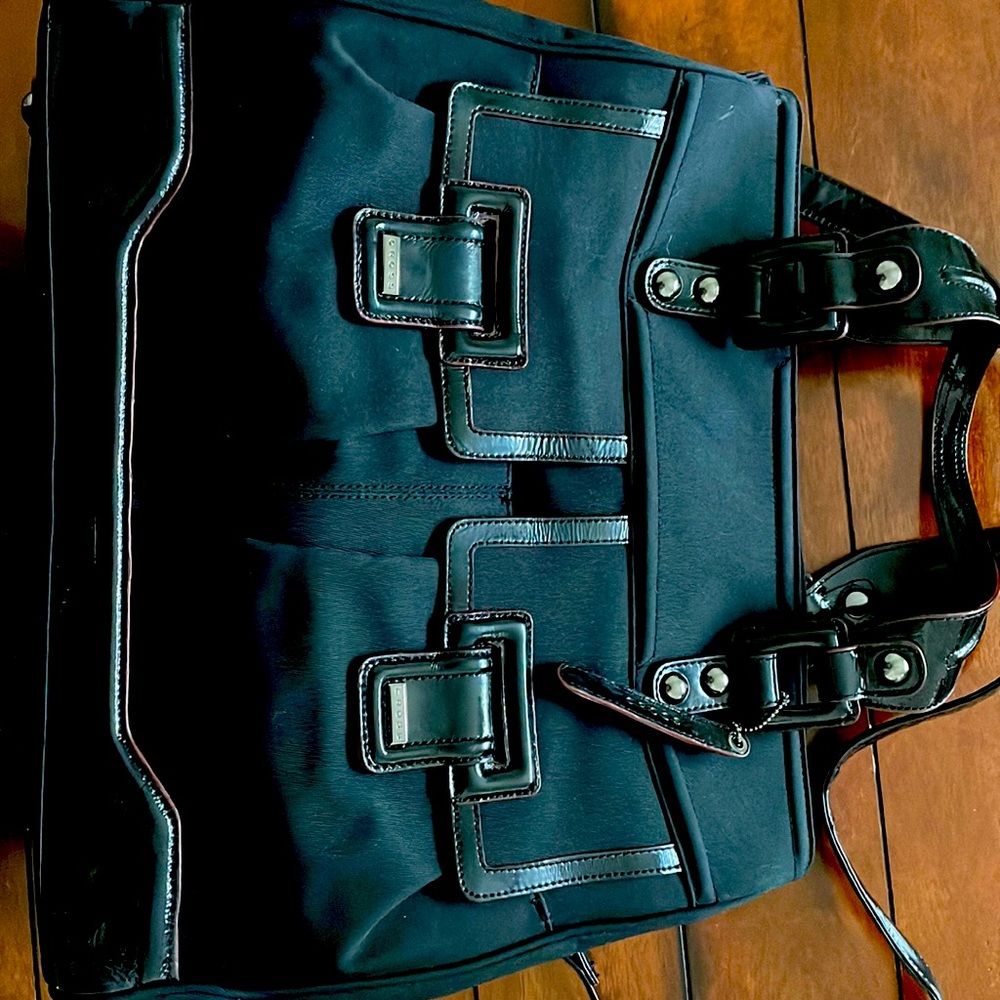 cross woman’s briefcase